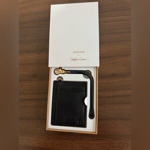 Andar x Daryl-Ann Denner collaborative wallet in a white box